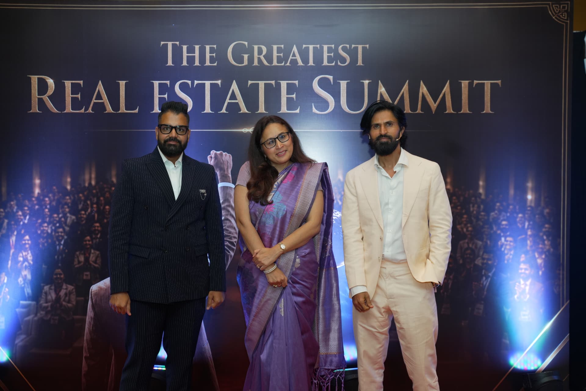 Dev Gadhvi and CA Mayur Mehta with a guest at The Greatest Real Estate Summit